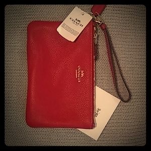 Red leather Coach wristlet